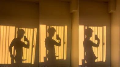 Mon ombre en train de branler ma bite dure