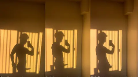 Mon ombre en train de branler ma bite dure