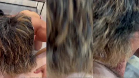 Pipe en gros plan par un pote aux cheveux bouclés